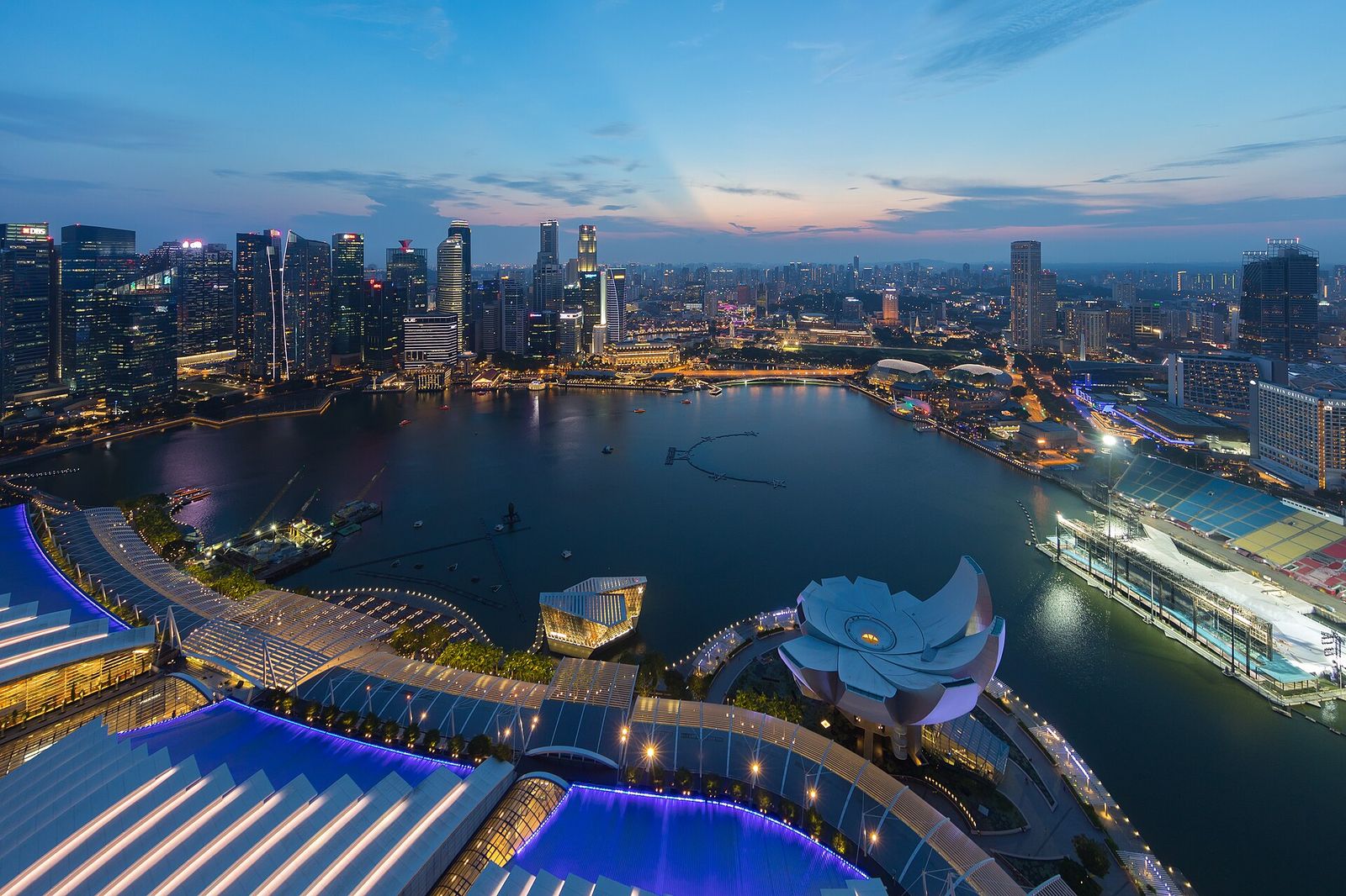 Marina Bay and Singapore's central business district skyline at dusk