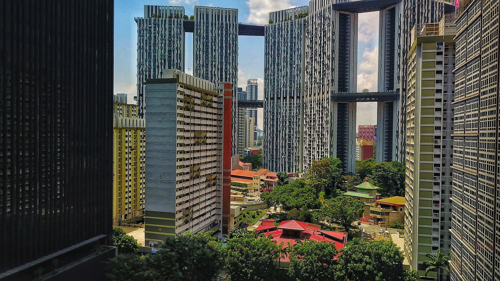 Tanjong Pagar housing estate — HDB blocks and shophouse rooftops with the Pinnacle@Duxton towers behind