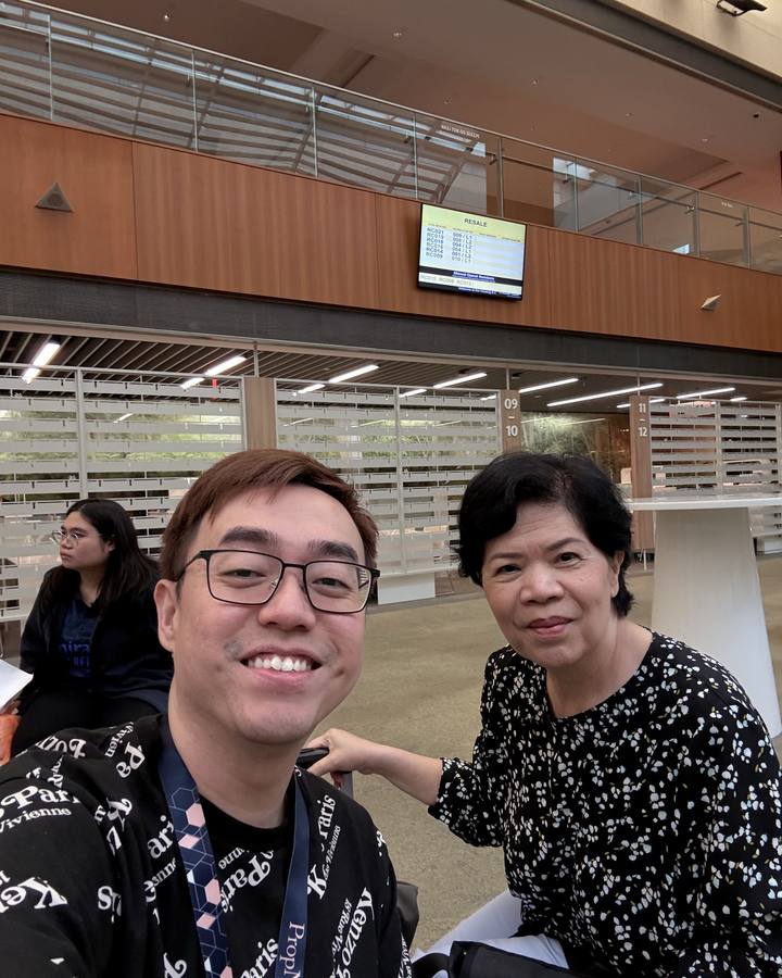Melvin with a client at an HDB resale appointment